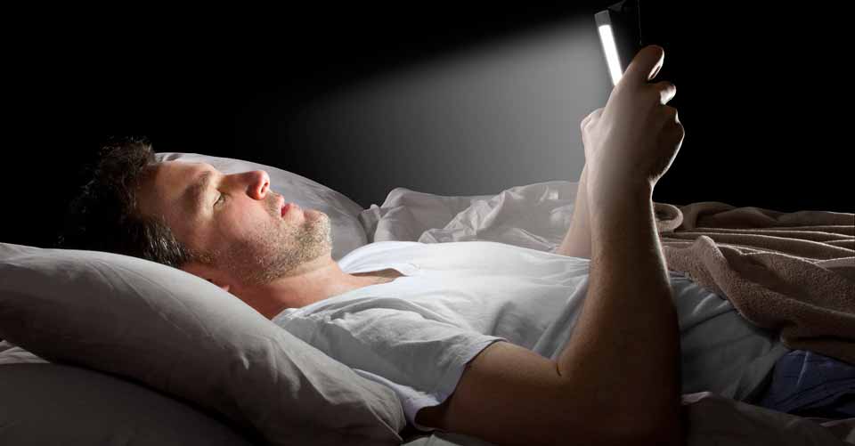 How checking your cellphone before you go to bed can seriously damage your health.