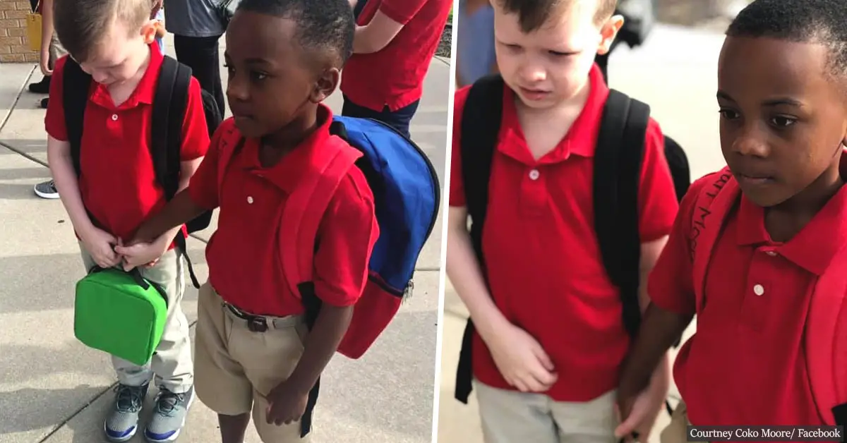 Heartwarming moment an eight-year-old boy consoles his crying autistic classmate on their first day of school in a viral photo