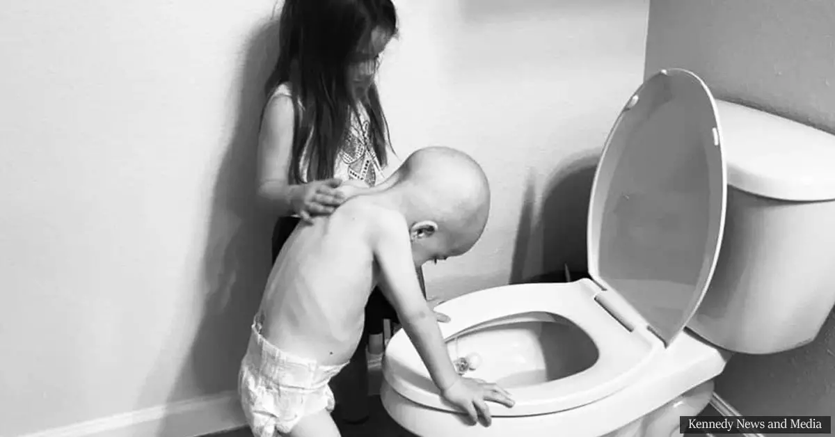 Sister soothes ill little brother battling leukemia in heartbreaking photo