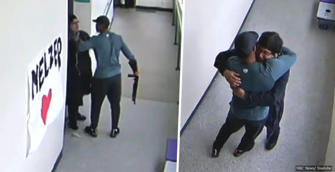 Student carrying loaded shotgun stopped and disarmed by football coach with a hug