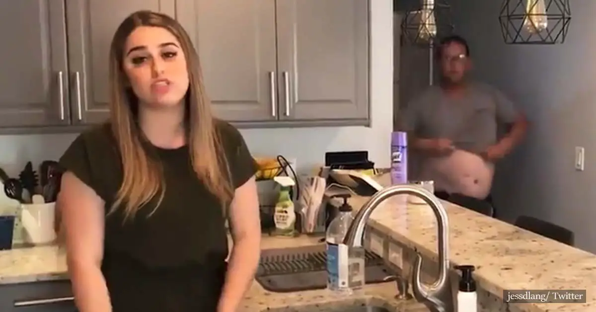 Stay-at-home news reporter's broadcast interrupted by her topless dad