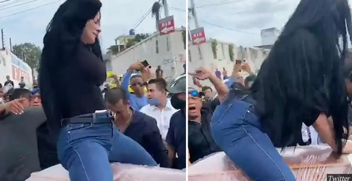 Woman TWERKS on top of a coffin in front of cheering crowd