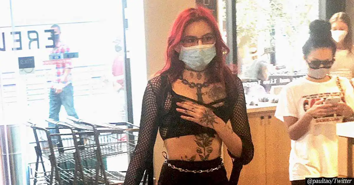 Dominatrix shocks the world after walking man on leash through supermarket