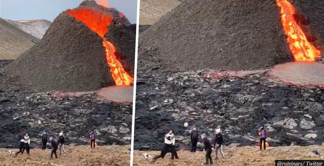 VIDEO: Friends casually play volleyball near erupting volcano