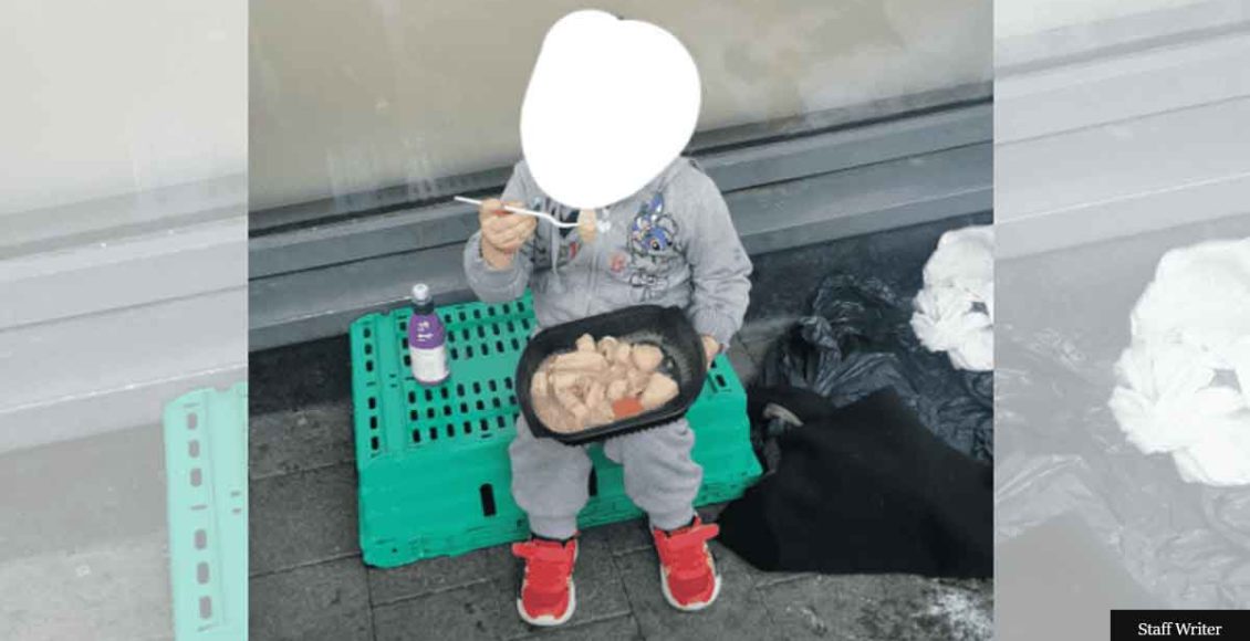 Outrage At Photo Of Homeless Girl, 4, Eating From Plastic Container On Sidewalk