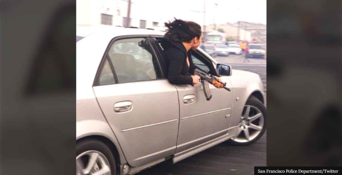 San Francisco: Woman leans out a moving car holding an AK-47